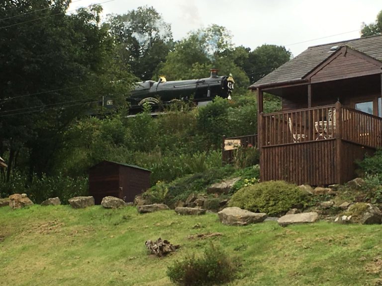 Steam locomotive travelling through the Severn Valley countryside